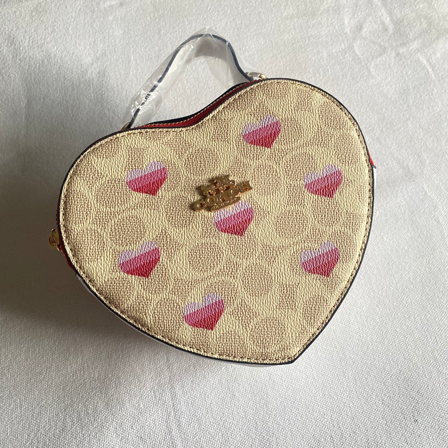 Bolsa de corazón tipo Coach