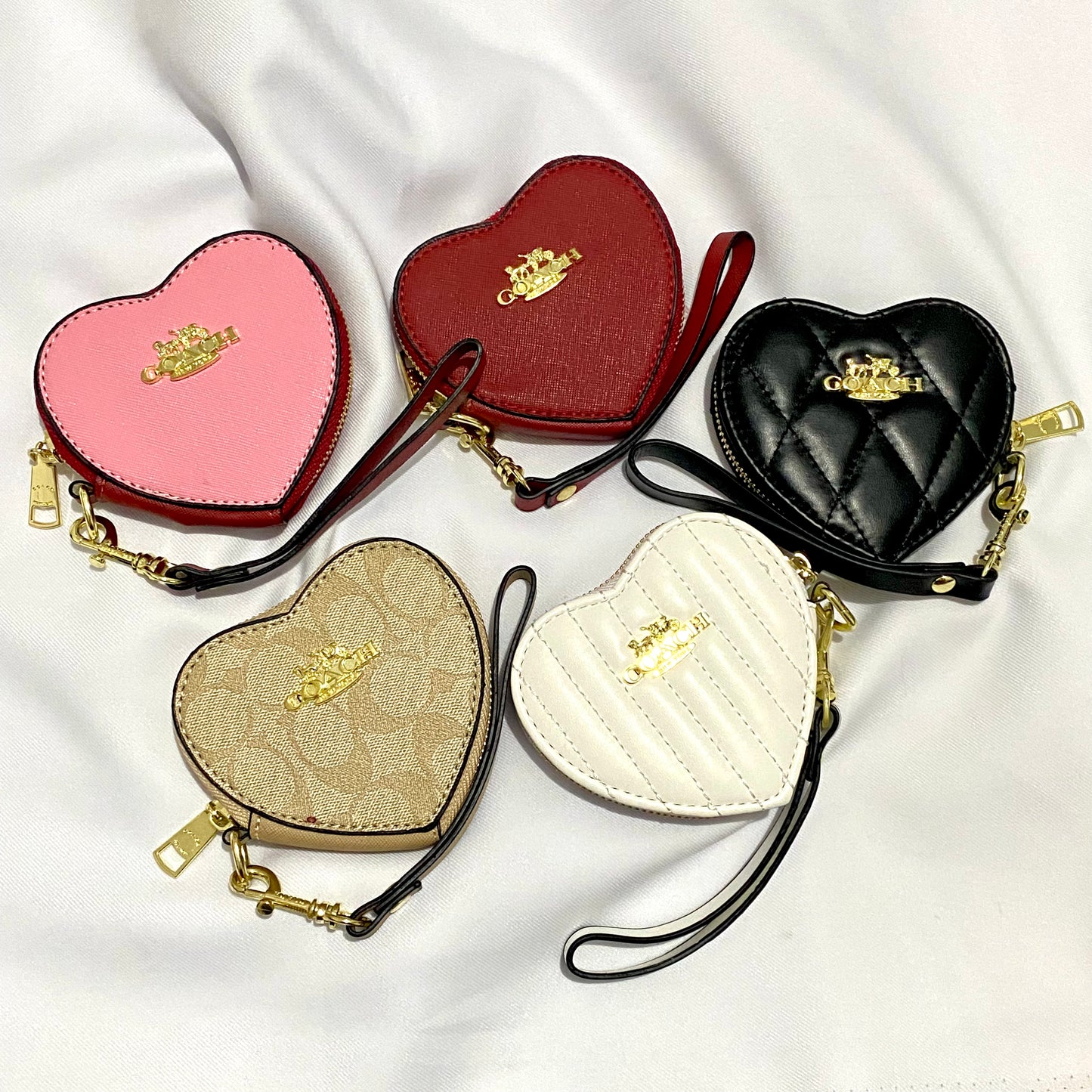 Monedero de corazón tipo Coach