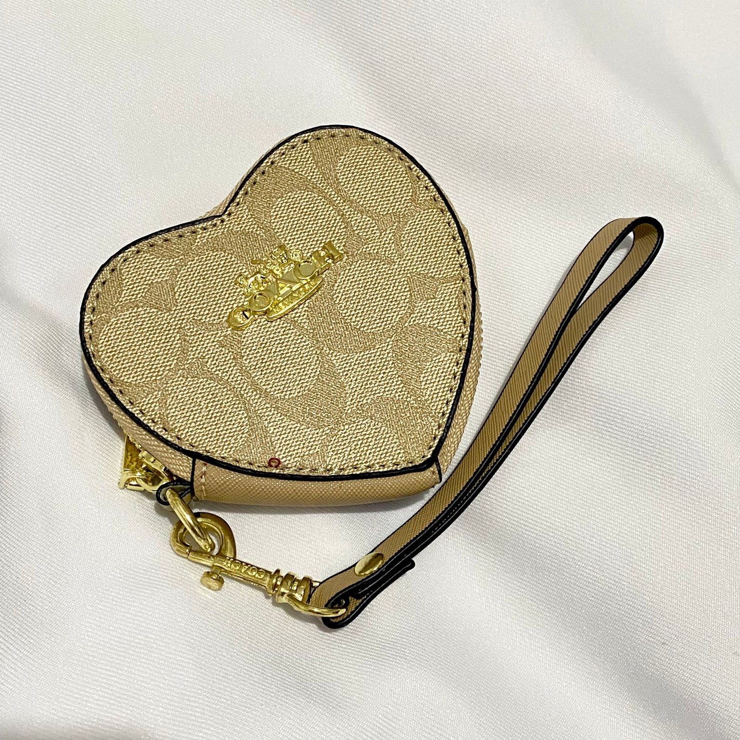 Monedero de corazón tipo Coach