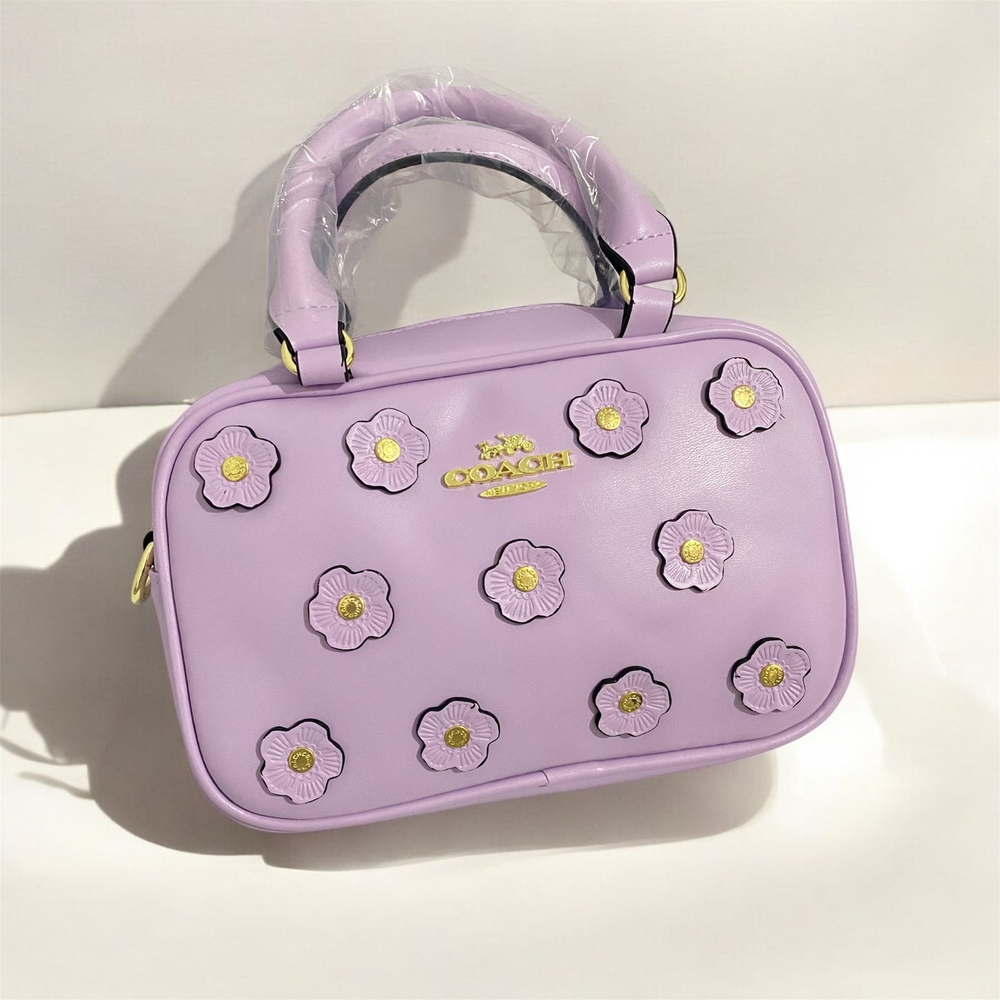 Crossbody tipo Coach, floral