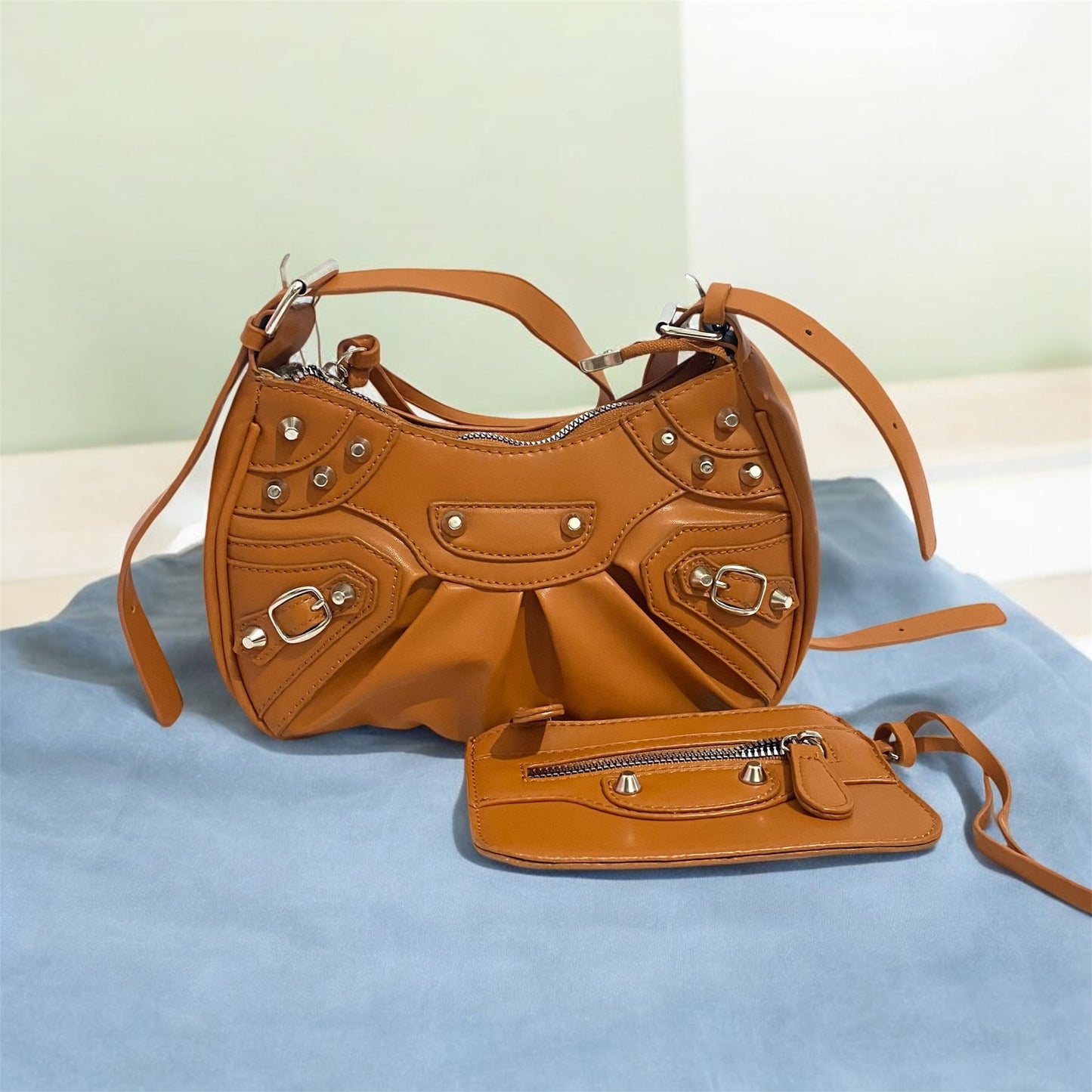 Shoulder bag con estoperoles