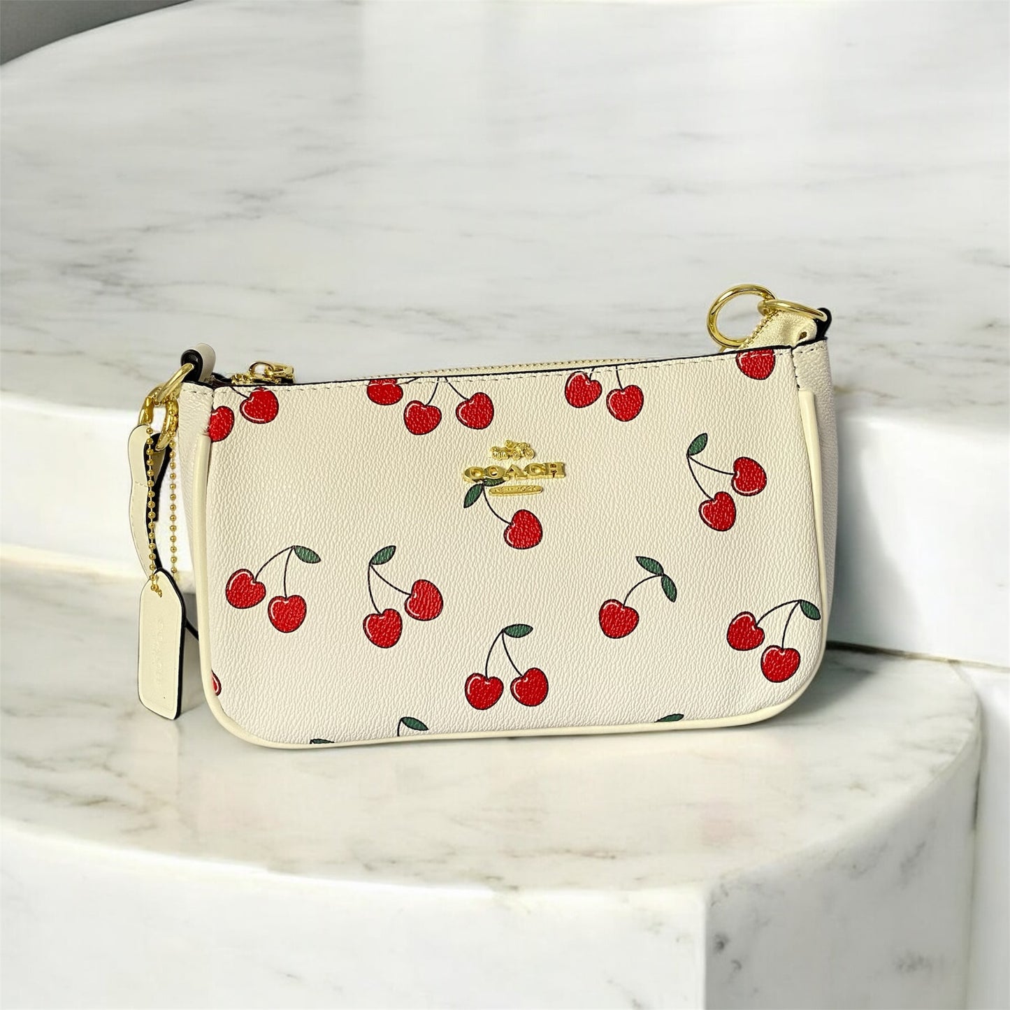 Nolita, tipo Coach