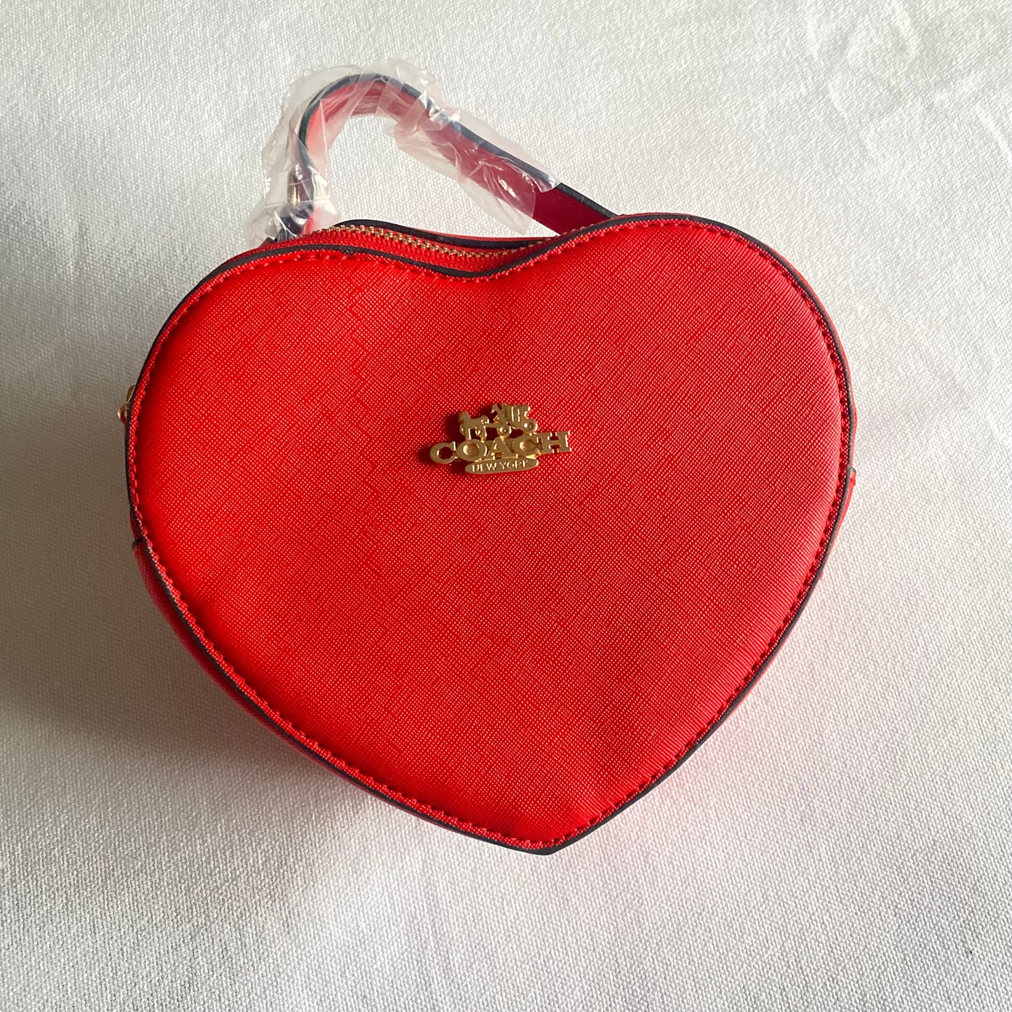 Bolsa de corazón tipo Coach