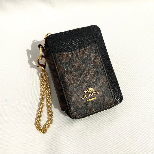 Tarjetero zip card, tipo coach