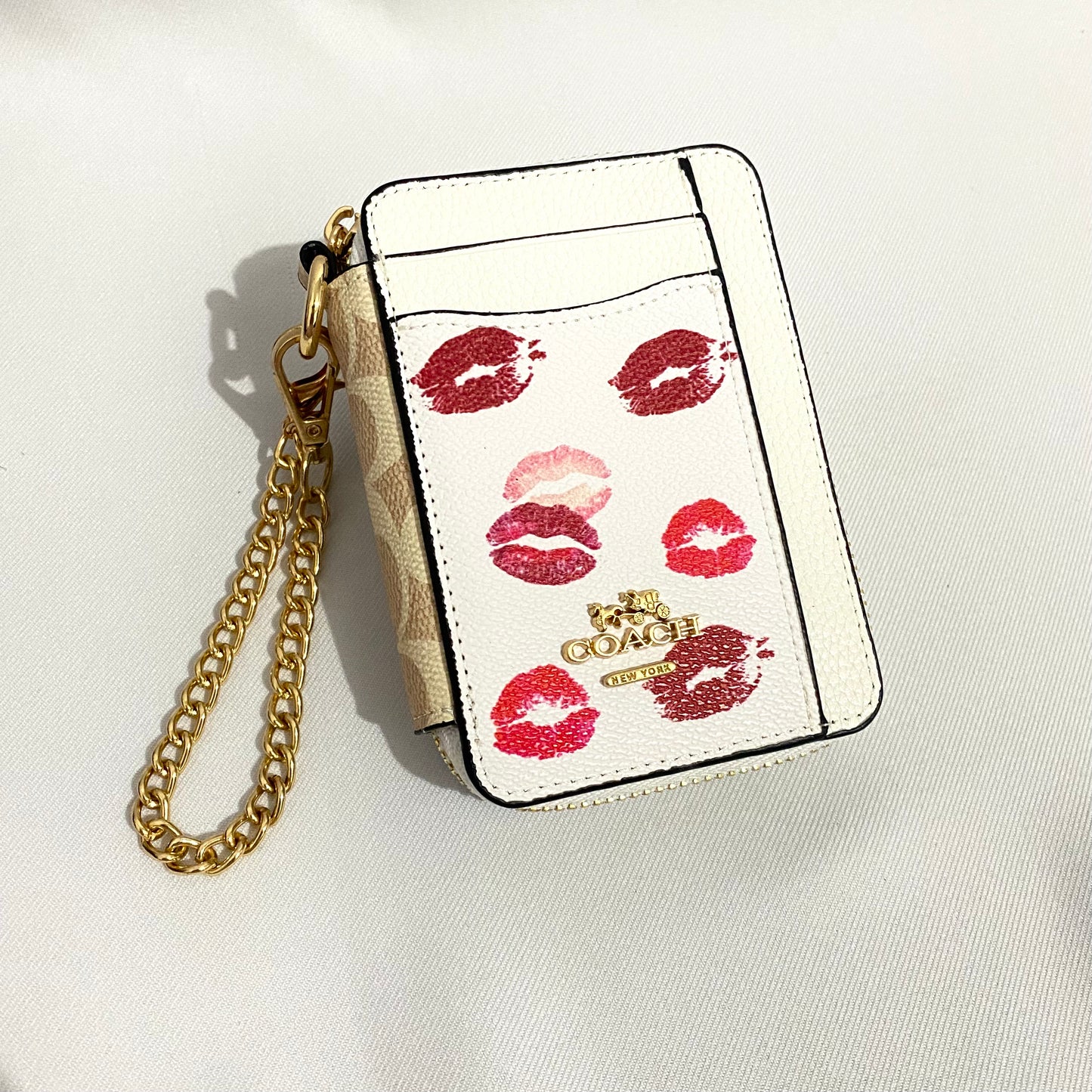 Tarjetero zip card, tipo coach