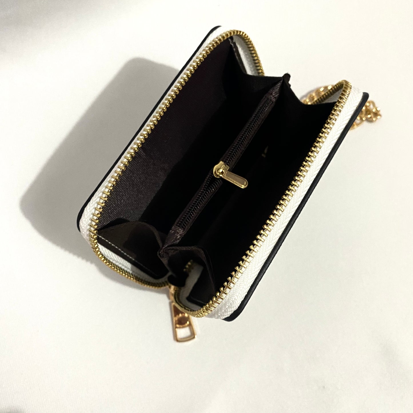 Tarjetero zip card, tipo coach