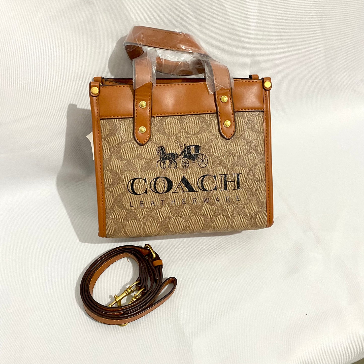 Bolsa grande tipo Coach