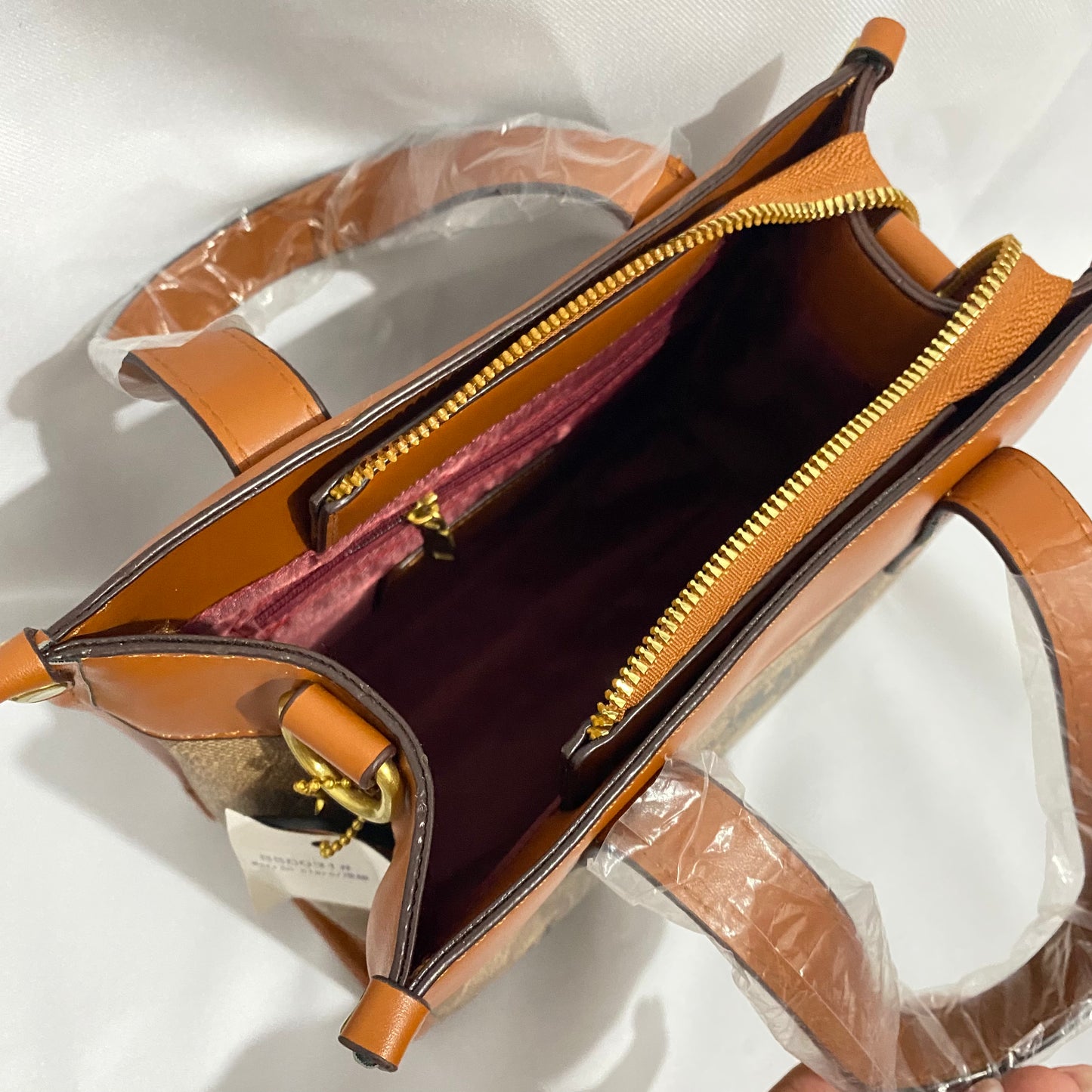 Bolsa grande tipo Coach