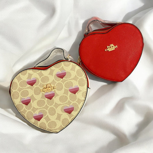 Bolsa de corazón tipo Coach