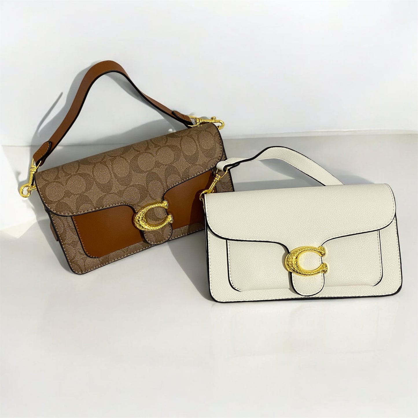 Tabby, tipo Coach, broche con textura