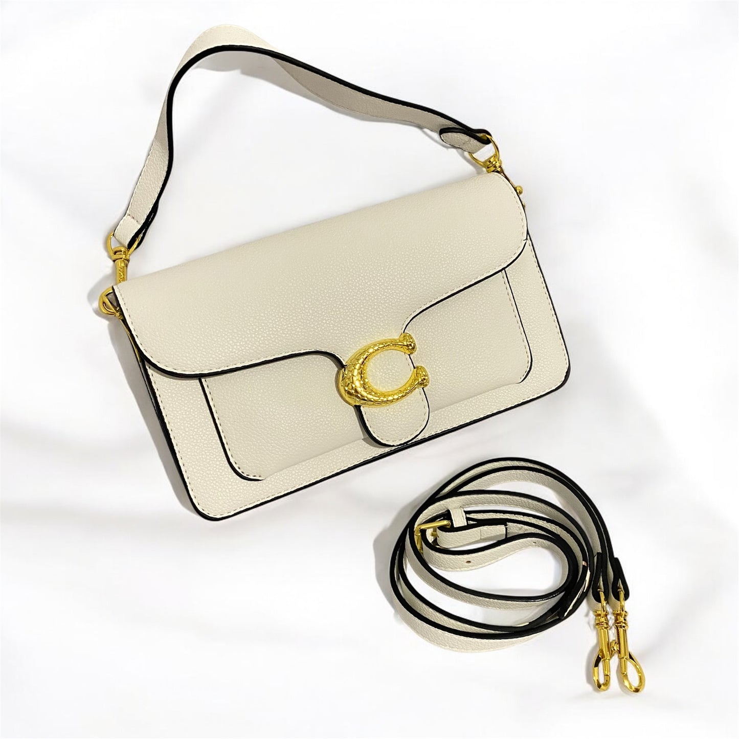 Tabby, tipo Coach, broche con textura