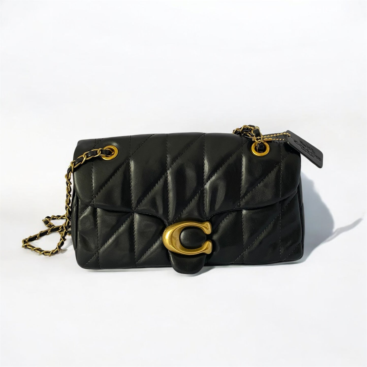 Tabby tipo Coach, acolchada.